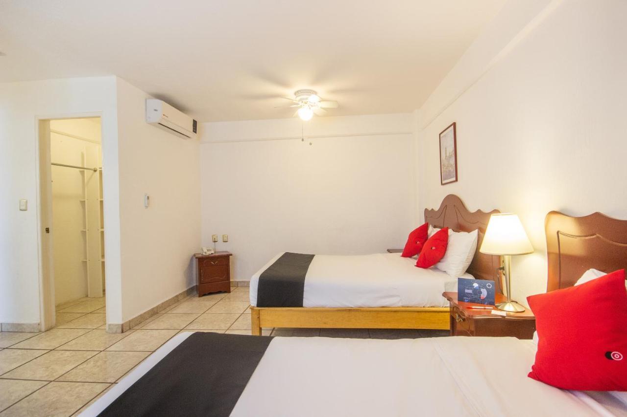 Capital O Hotel Suites Andrade Леон Экстерьер фото