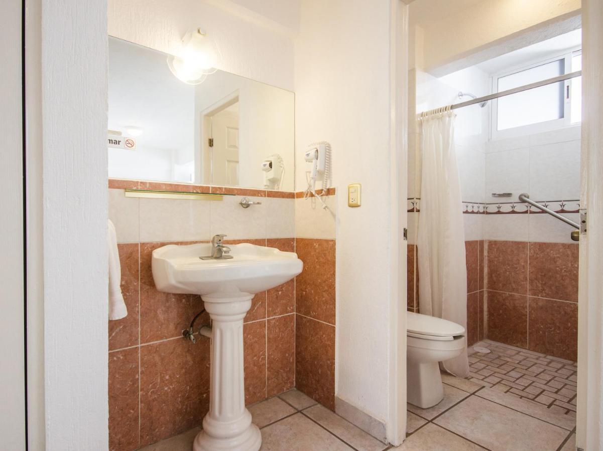 Capital O Hotel Suites Andrade Леон Экстерьер фото