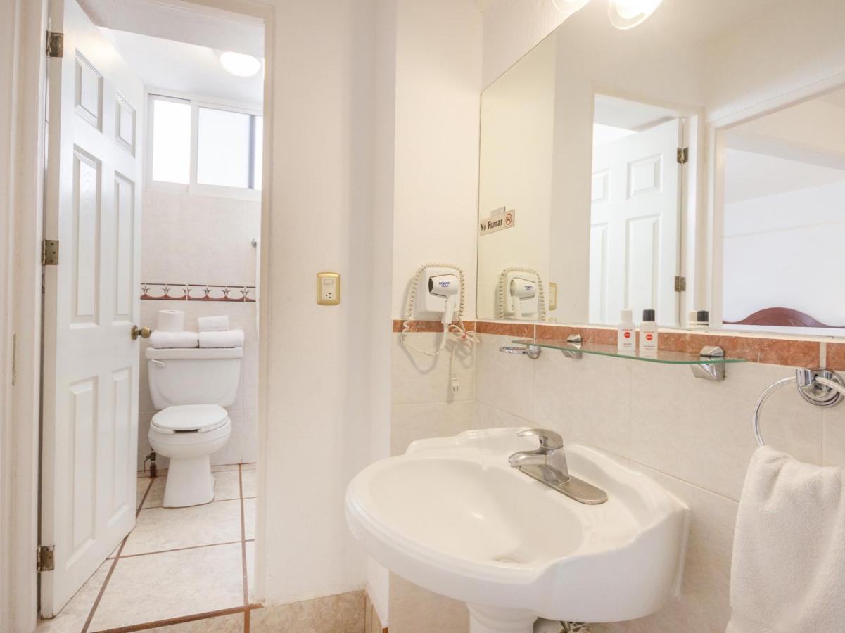 Capital O Hotel Suites Andrade Леон Экстерьер фото